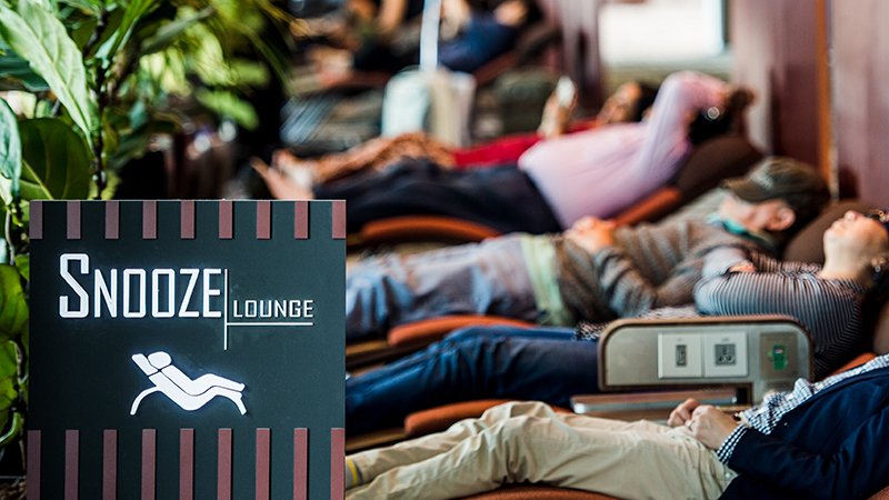 Travellers catching up on their sleep at Changi Airport's snooze lounges